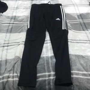 Black and white adidas pants